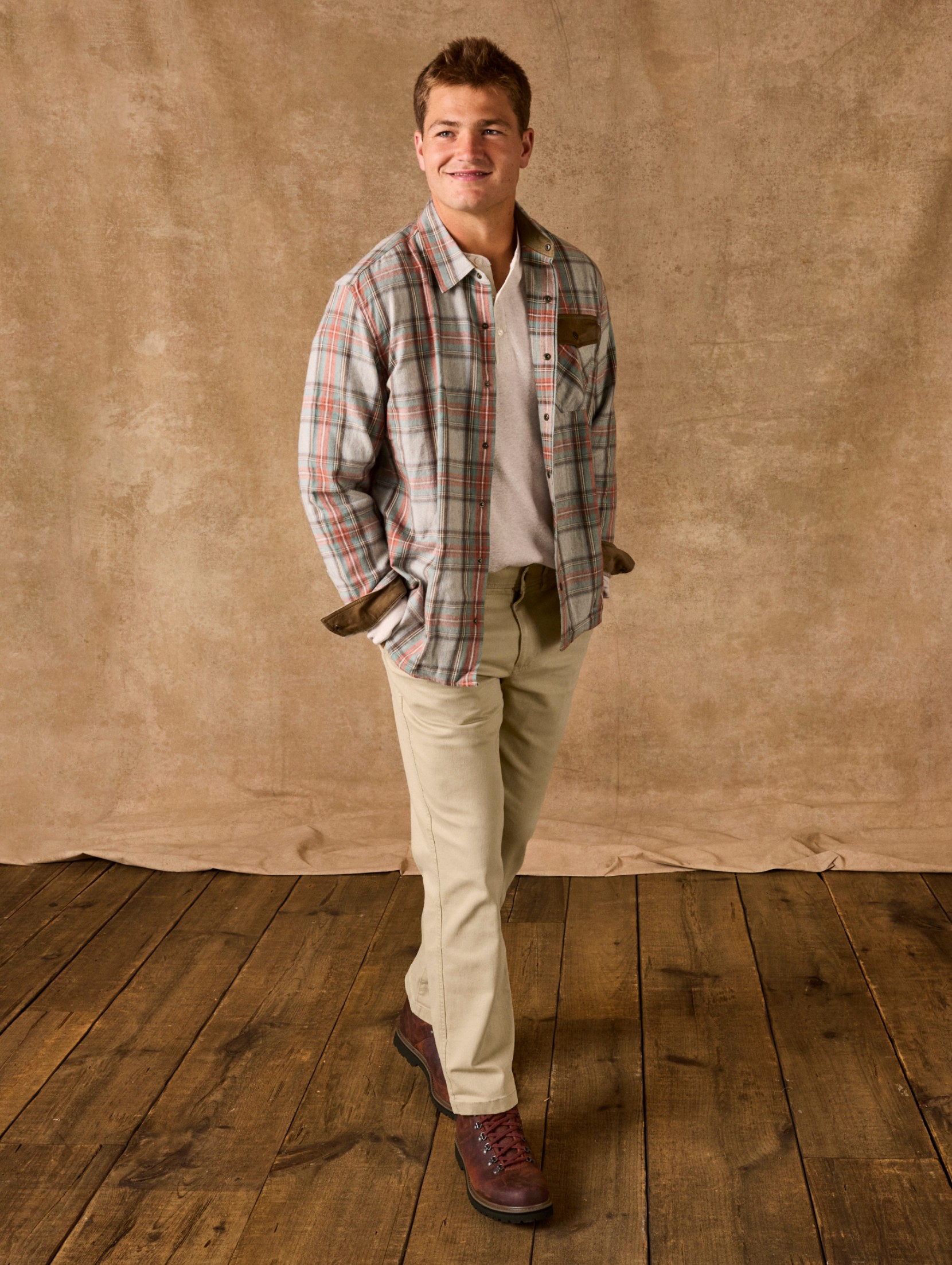 Drake Maye wearing a Scotch Plaid Flannel Shirt and tan Bean's Field Chinos.