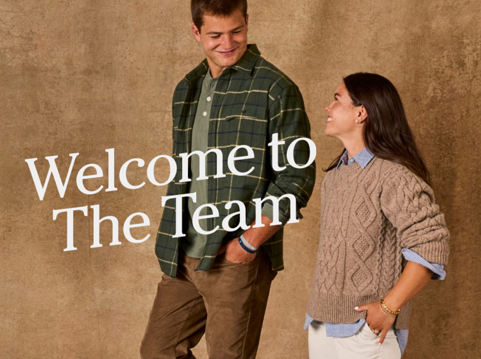 Drake and Ann Michael Maye looking at each other and smiling, wearing L.L.Bean apparel with text "Welcome to The Team".