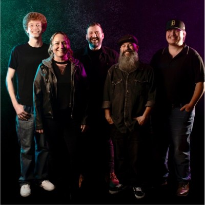 Andi Fawcett Country, 5 people, dark surroundings.