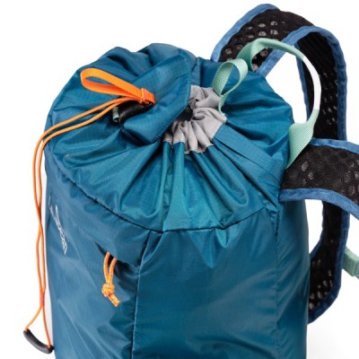 Close up image of the closed top of a blue L. L. Bean Stowaway Pack.