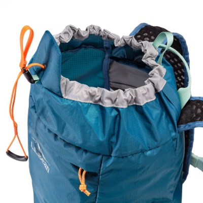 Close up image of the open top of a blue L. L. Bean Stowaway Pack.