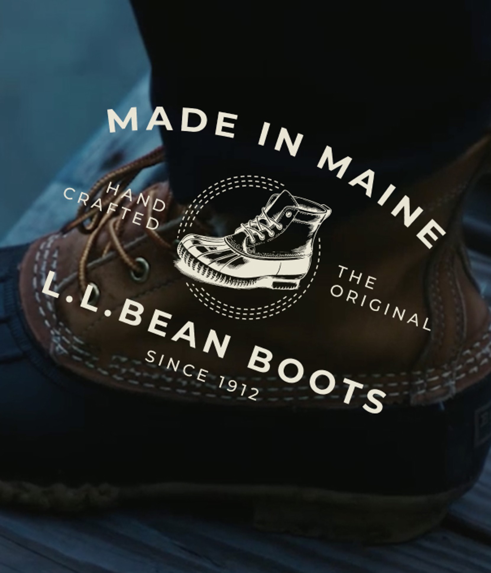 Close-up of a classic brown Bean Boot with vintage L.L.Bean Boots logo overlay and "Made in Maine" branding.
