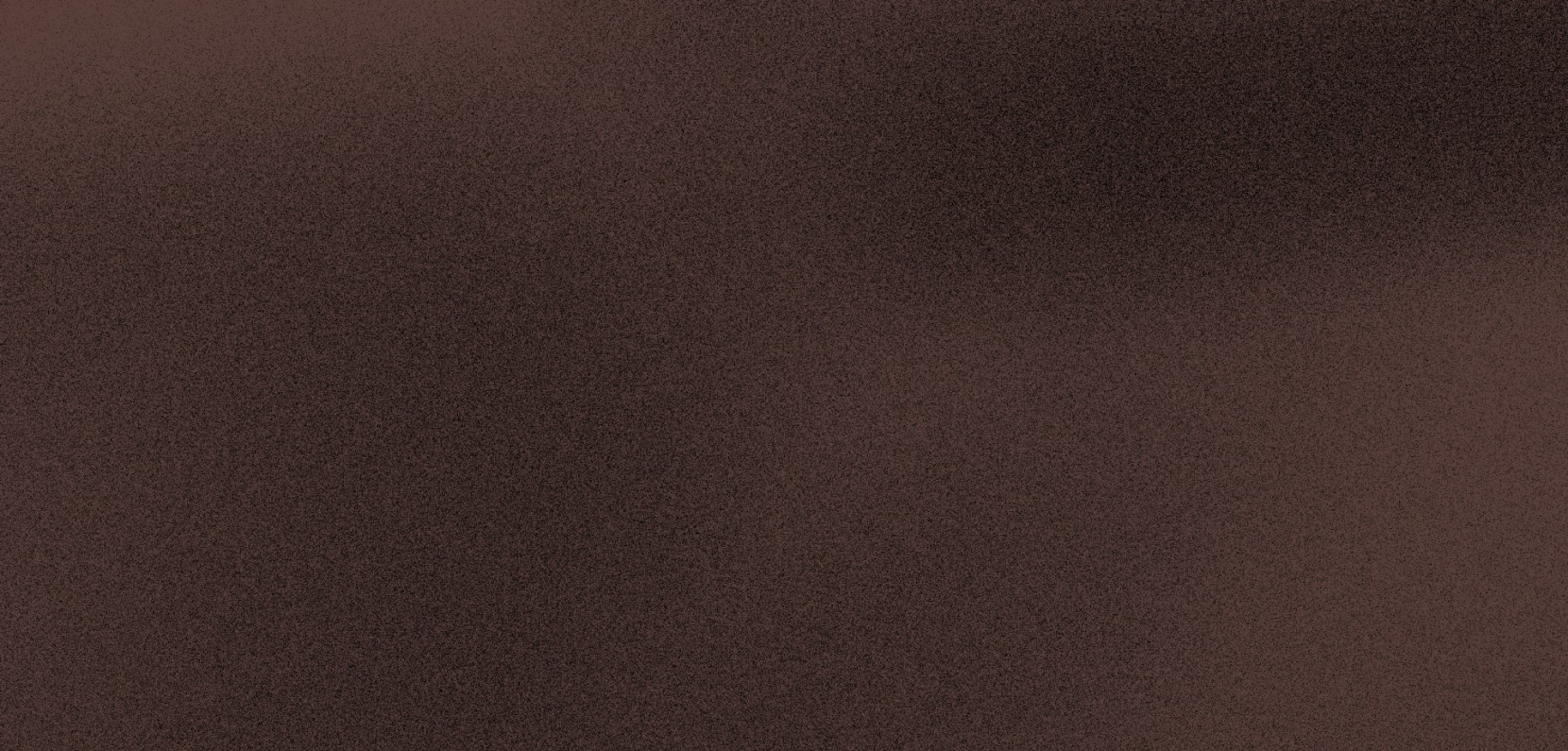 Dark brown textured surface with a subtle mottled pattern and soft tonal variations.