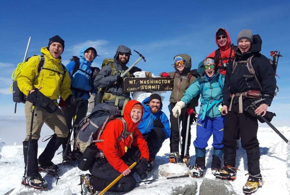 L.L.Bean Outing Club members summiting Mount Washington in the winter. 
