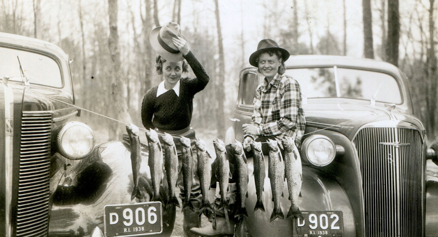 Atha Inerson and Hazel Bean with fish they've caught.