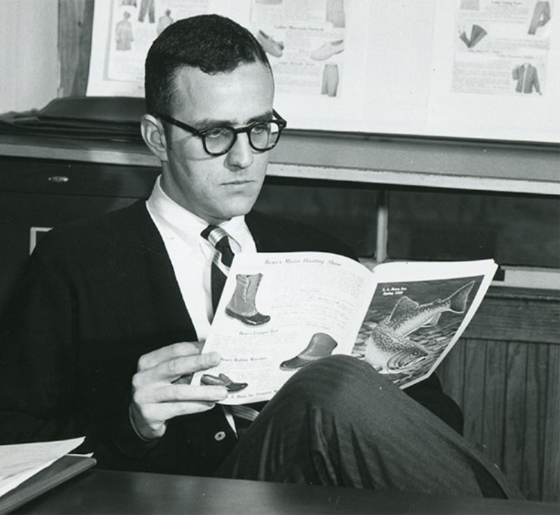 Leon Gorman reading an L.L.Bean catalog.