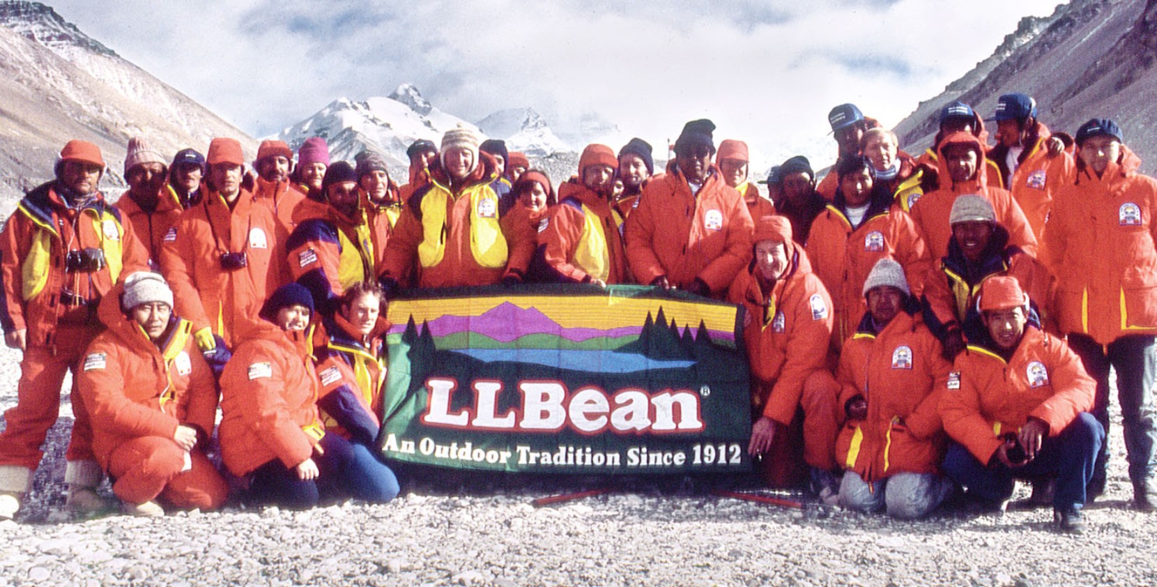 Members of the Everest Peace Climb pose with an L.L.Bean flag.