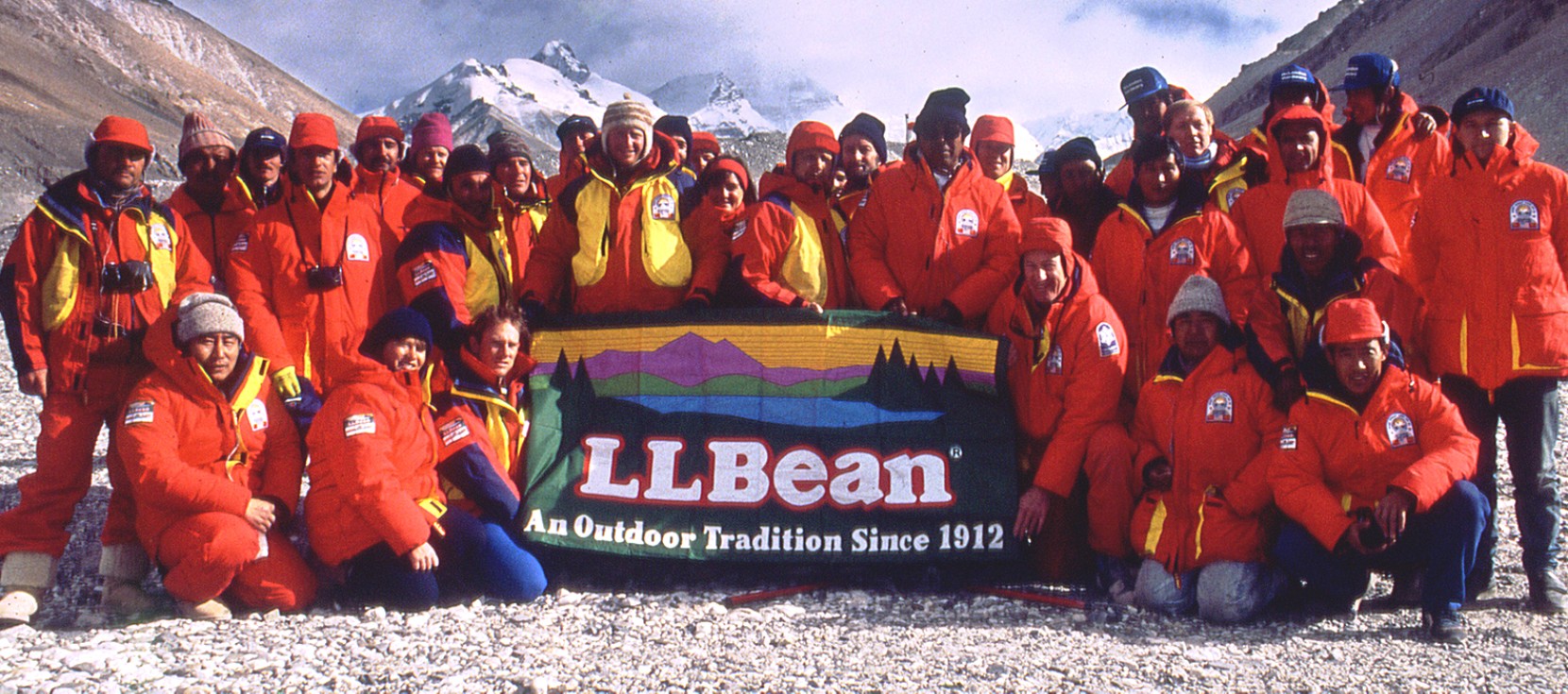 Members of the Everest Peace Climb hold an L.L.Bean flag.