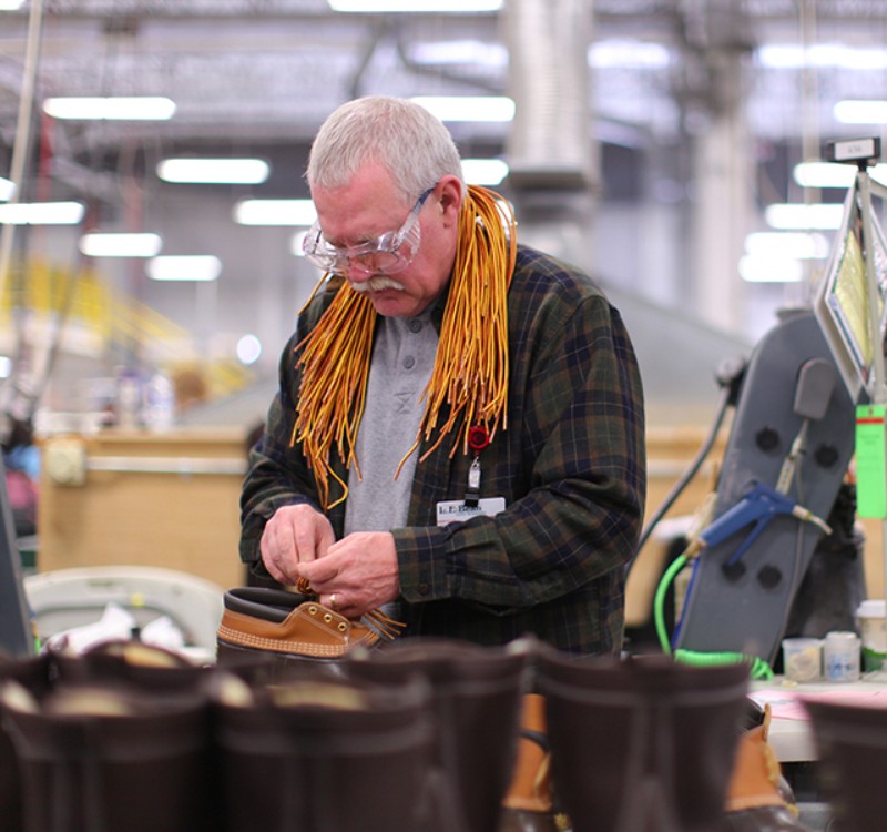 A pair of L.L.Bean Boots being laced