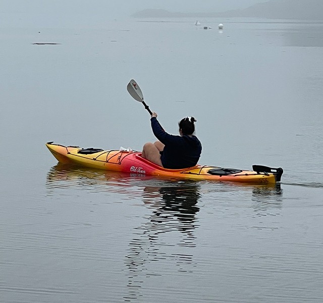 Katie kayaking in Maine