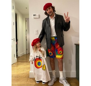 Mordechai Rubinstein and his daughter in matching tie-dye outfits